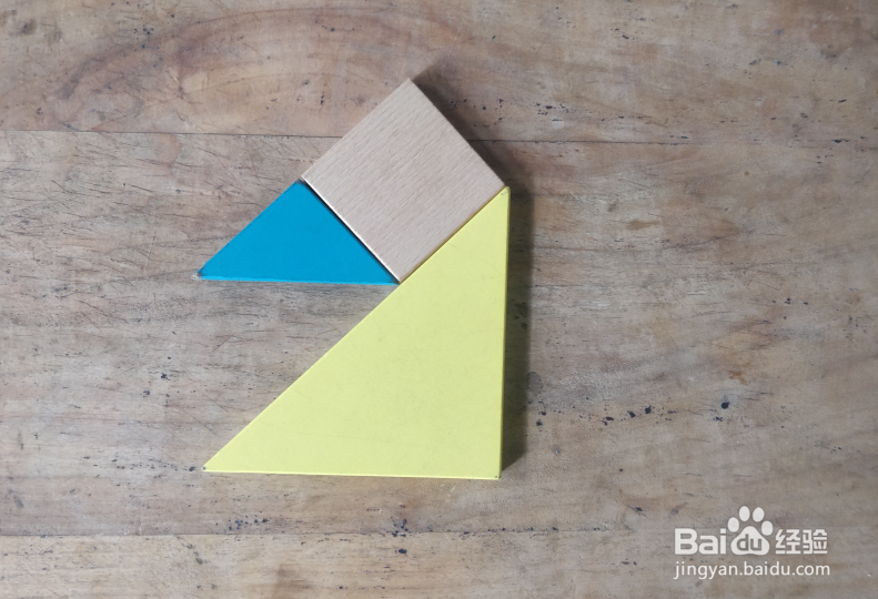 用七巧板怎样拼一只兴奋拍打鳍肢的企鹅?