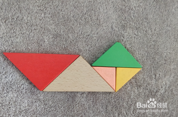 用七巧板怎样拼一个坐船尾的女士?