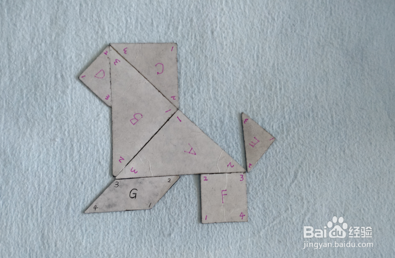 用七巧板怎样拼一只小狮子狗?