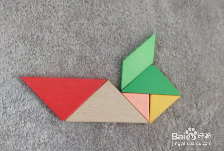 用七巧板怎样拼一个坐船尾的女士?