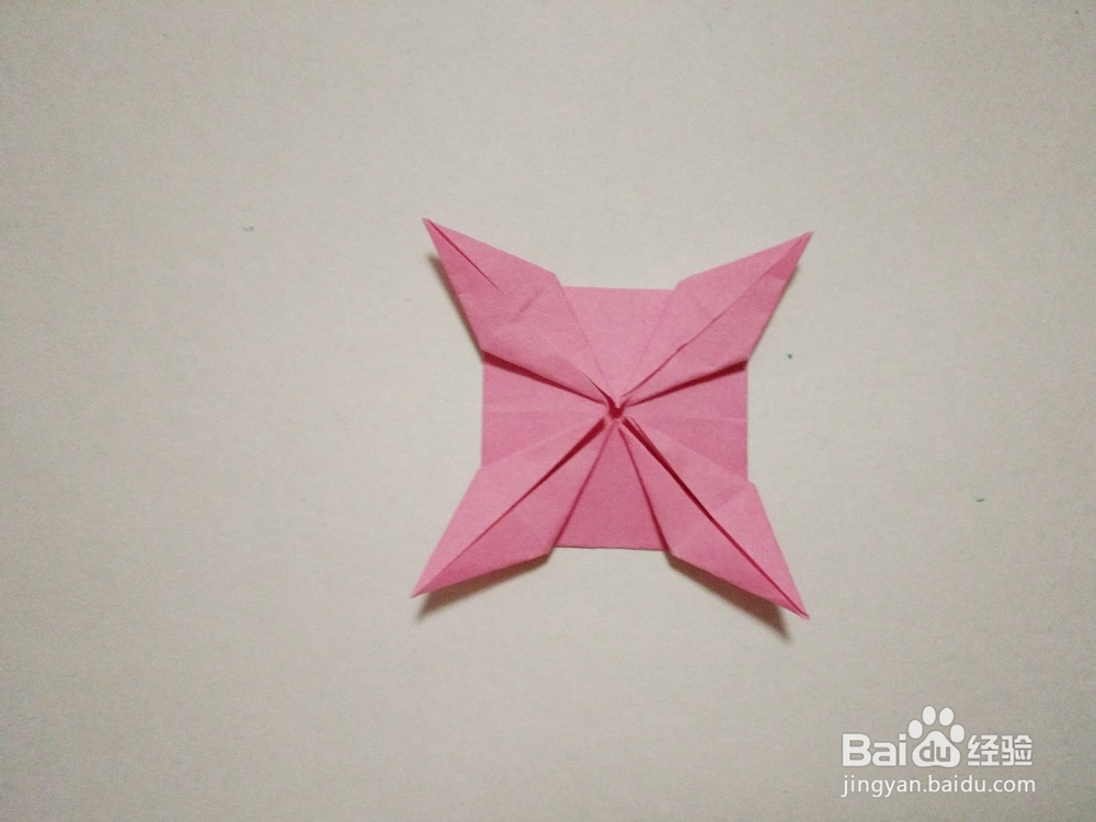 粉嫩的十二瓣立体纸花的折纸方法