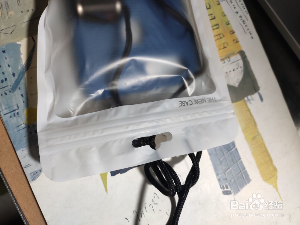 买手机壳送的挂绳怎么用