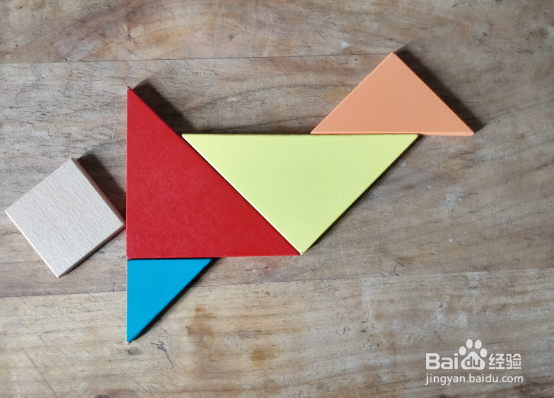 如何用七巧板拼一个玩跳房子游戏的小朋友？