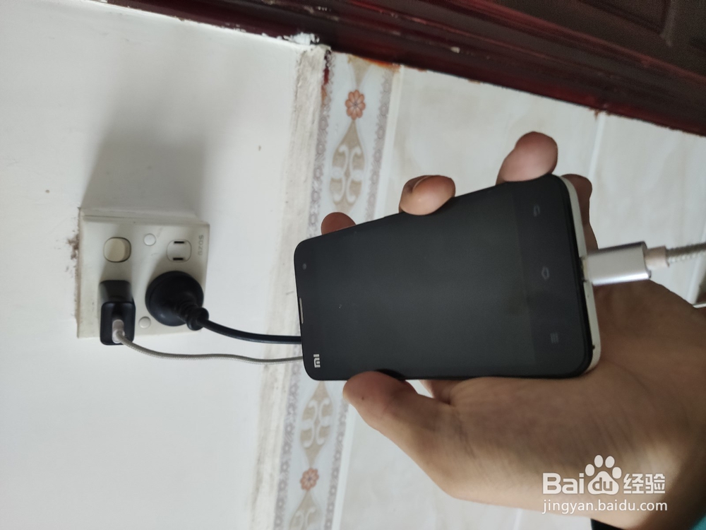 手机长时间不用充不进电怎么修复