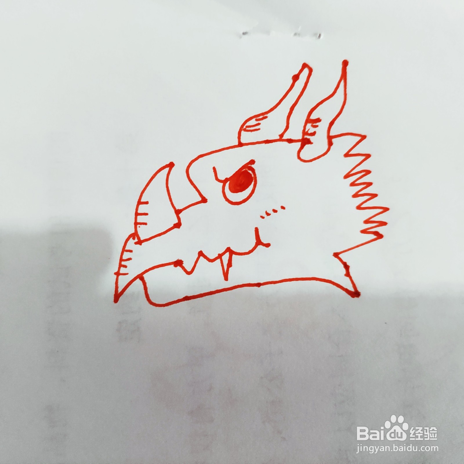 如何来画一只凶猛的大恐龙简笔画呢