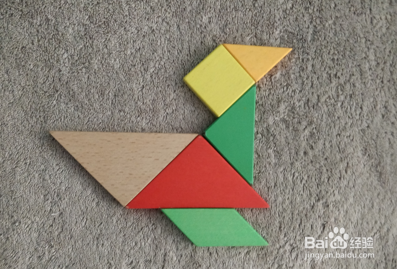 用七巧板怎样拼一只冰上滑行的企鹅？