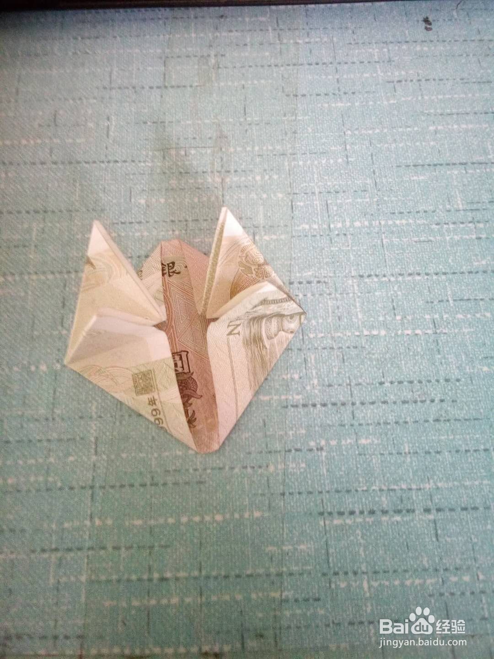 怎样用纸币折爱心