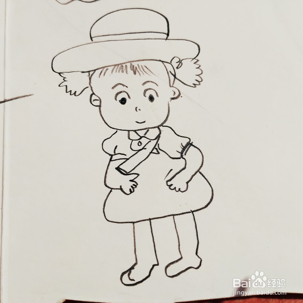 怎么来画一位戴帽子的卡通漂亮女孩简笔画