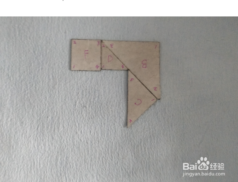 用七巧板怎样拼一只曲棍球杆?