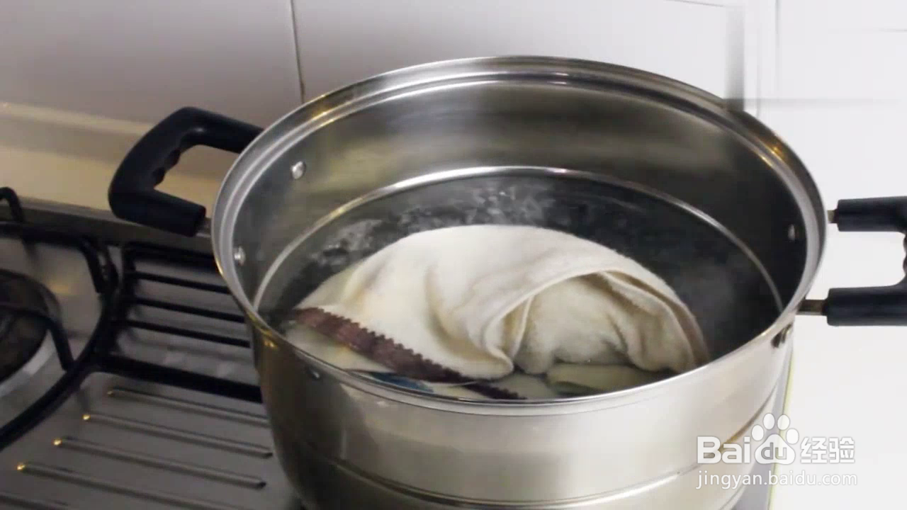 怎样将硬毛巾变软