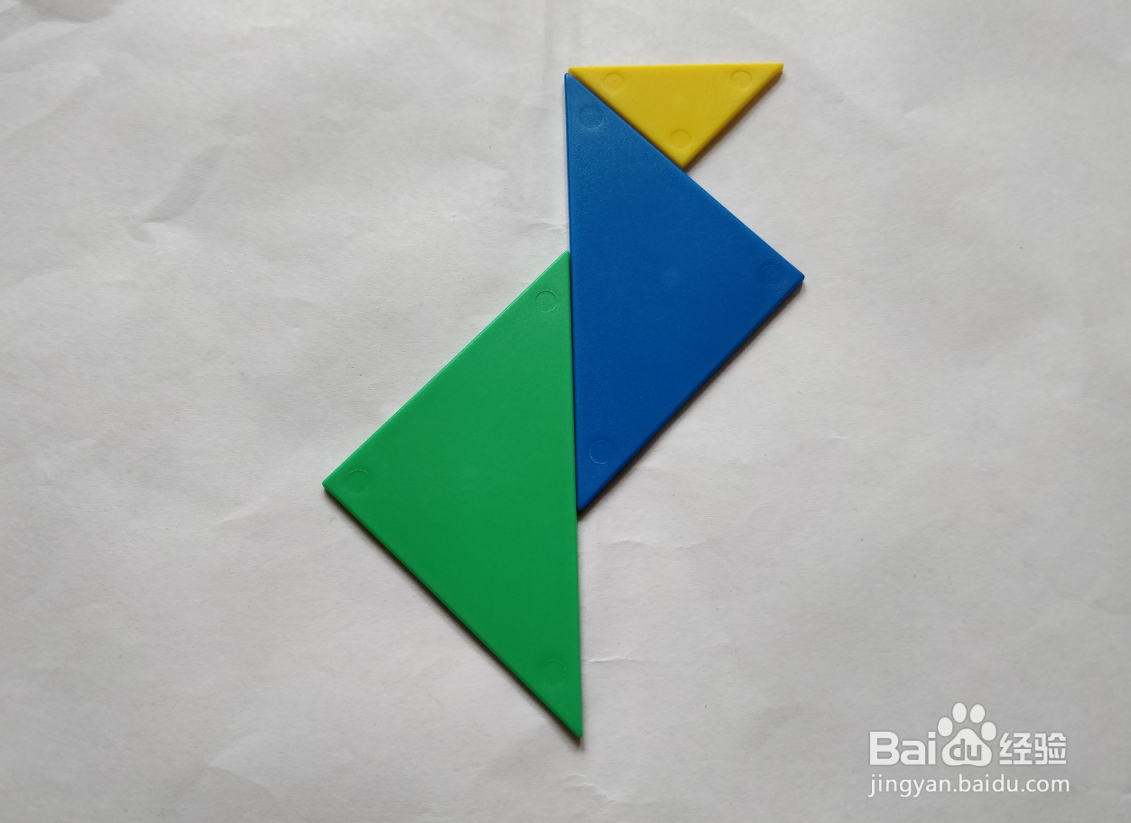 用(蝶式)七巧板怎么拼一只高兴跳跃的狗?