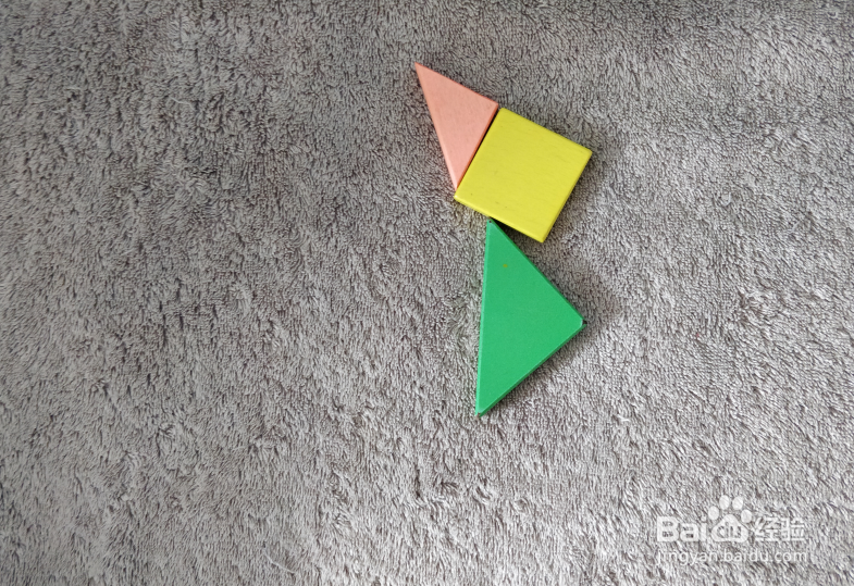 用七巧板怎样拼一个赶路的女士?