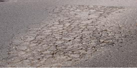 沥青混凝土松散的原因分析 不要照抄百度上的