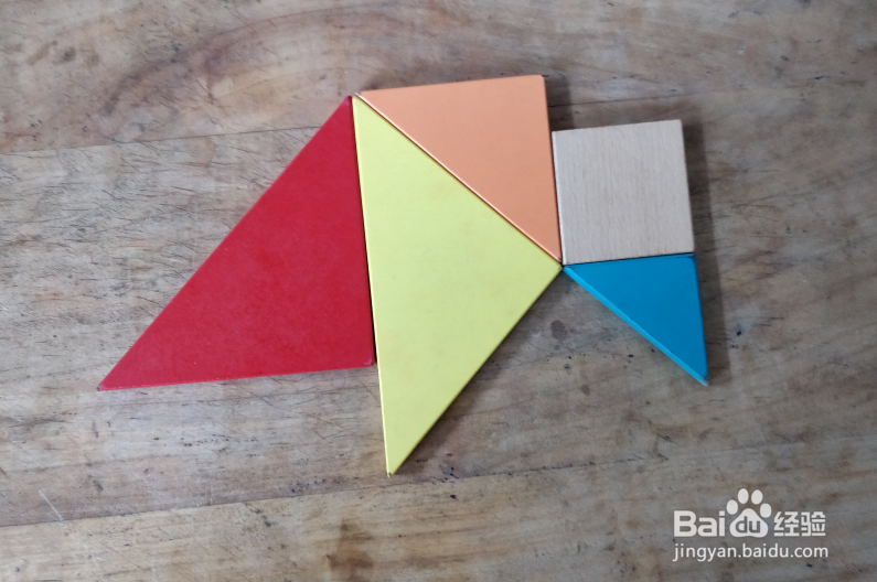 用七巧板怎样拼一只低着头的鸟儿？