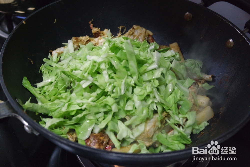 自己做梭子蟹炒年糕海鲜美食