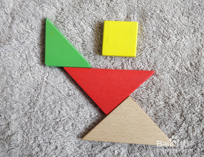 用七巧板怎么拼一个伸展运动的体育老师呢？