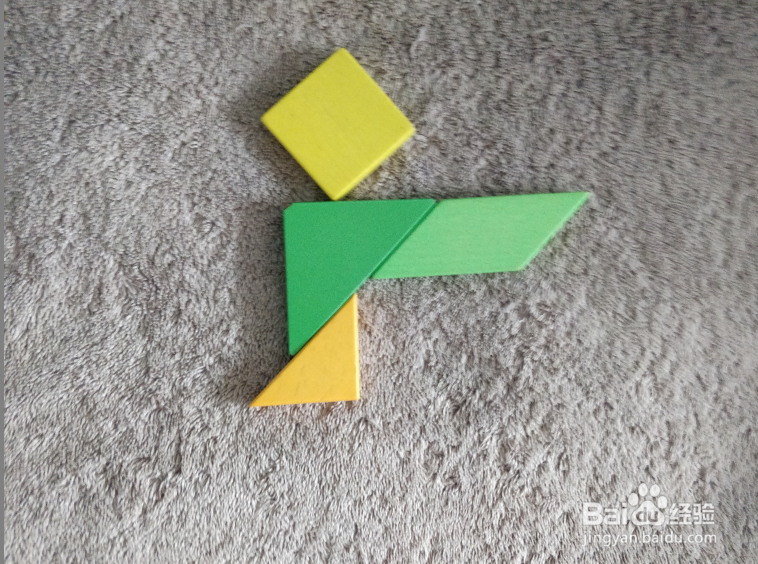 用七巧板怎样拼一个打车的女士?