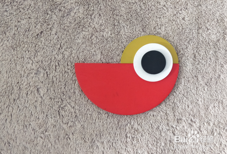 用蒙氏积木怎样拼一只站着扇翅膀的鸟儿？