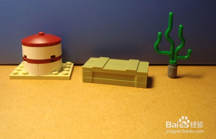 如何用积木拼装搬运桔子的场景