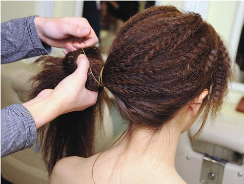 玉米夹板伤头发吗