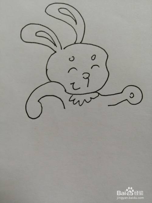 第四步,然后把可爱的小兔子的两只手画出来,注意小手细节的画法.