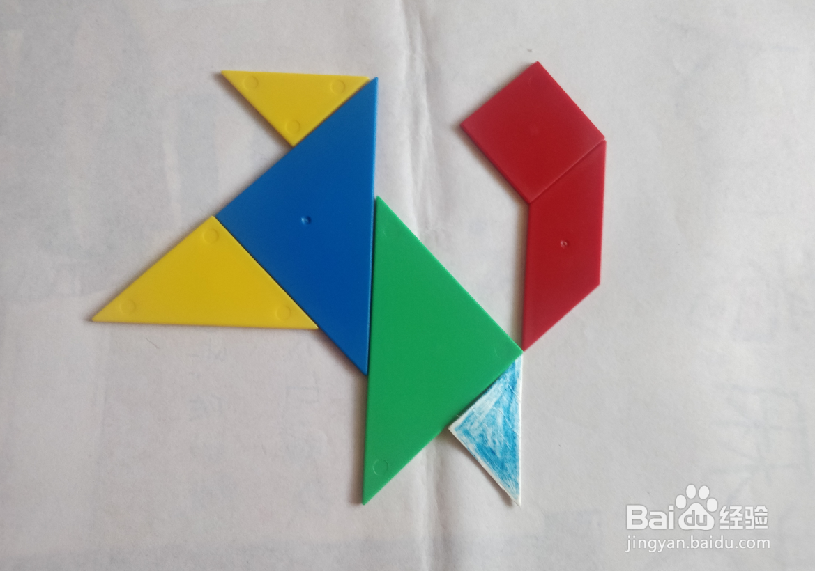 用传统七巧板怎么拼一只亲昵摇尾巴的狗?