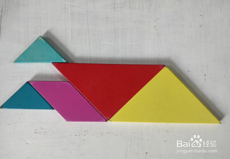 用七巧板怎样拼一个趴着的小孩儿?