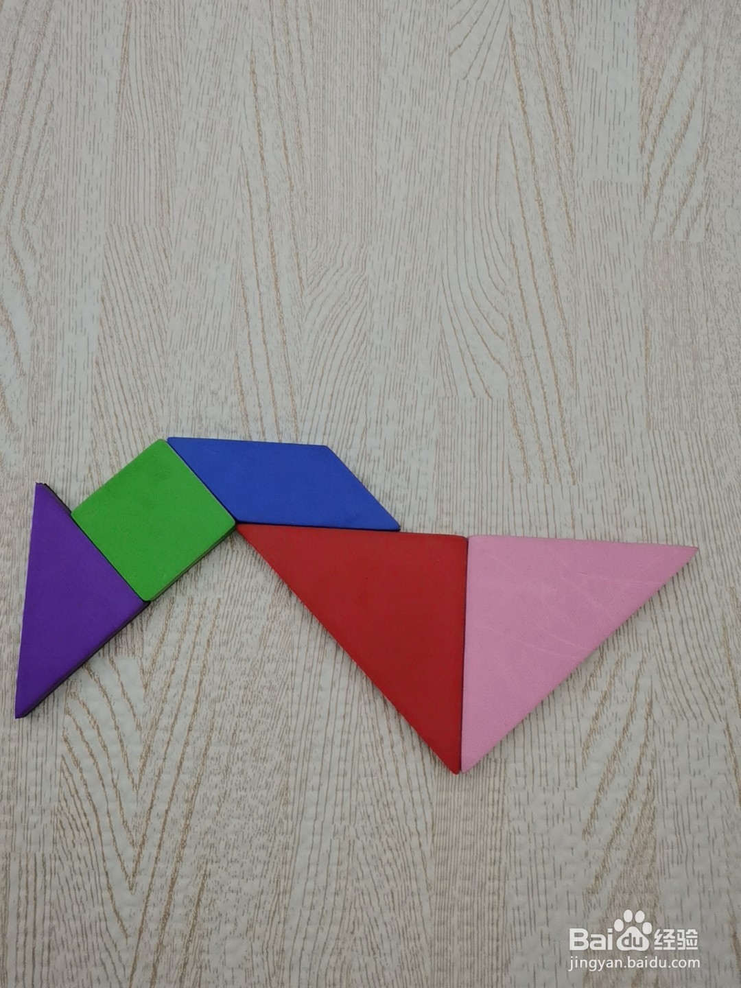 怎么样用七巧板拼一只捉虫子的小鸡仔