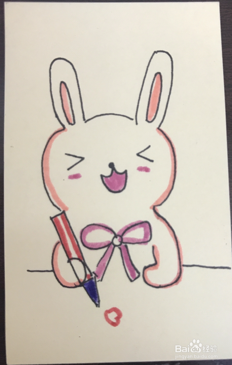 如何绘制一只拿着笔画画的兔子？