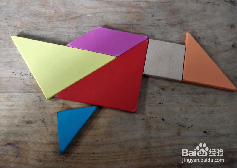 用七巧板怎样拼一只向前跑的小鸡？