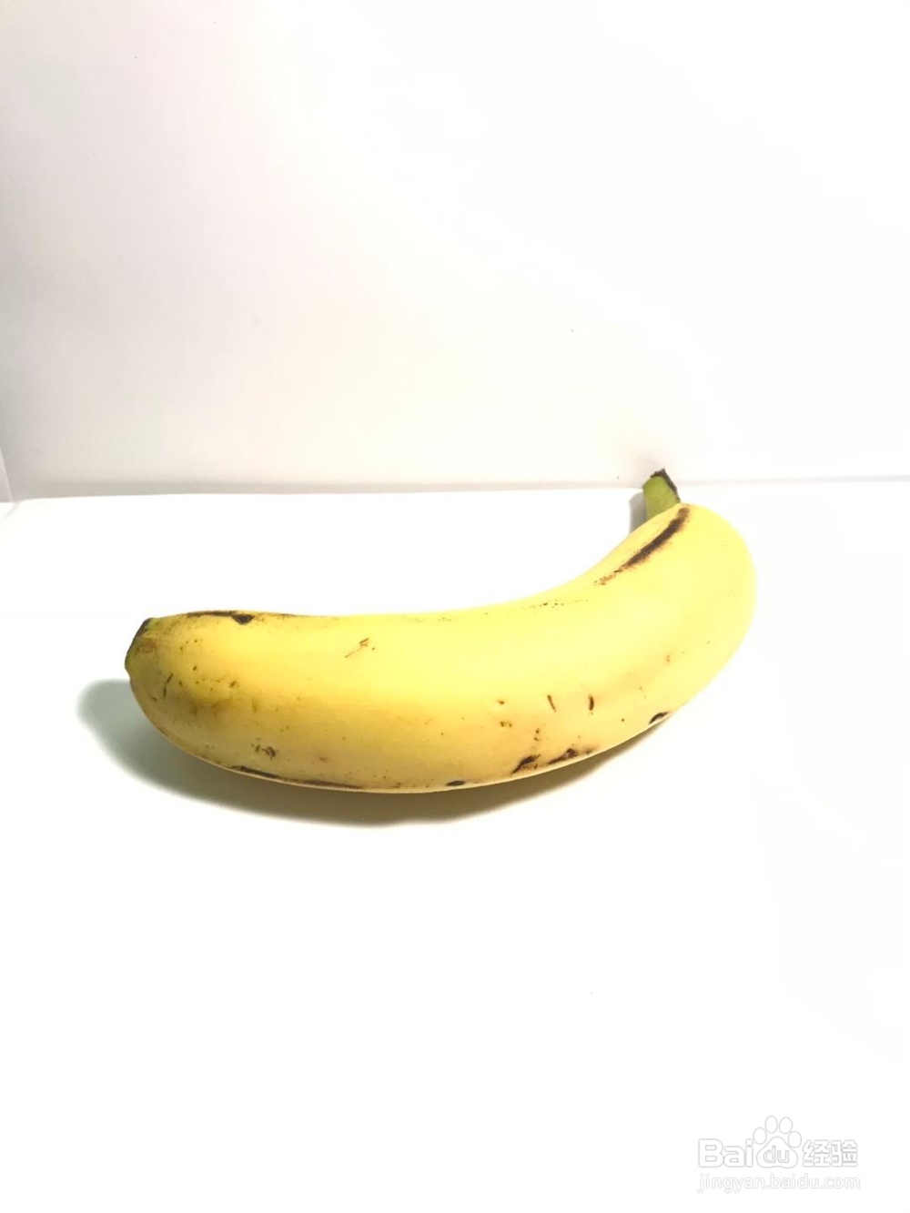 苹果手机怎么设置相机才能把人物拍白