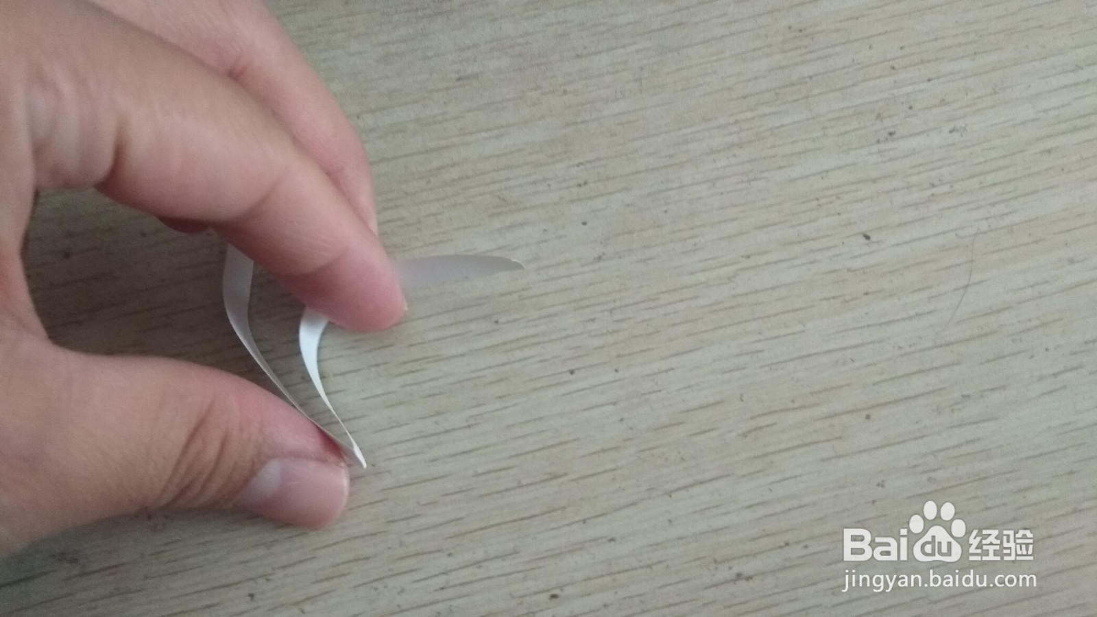 如何用一个长方形纸条做两面放中性笔的支架