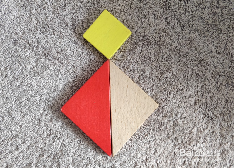 坐着的小猫用七巧板怎么拼