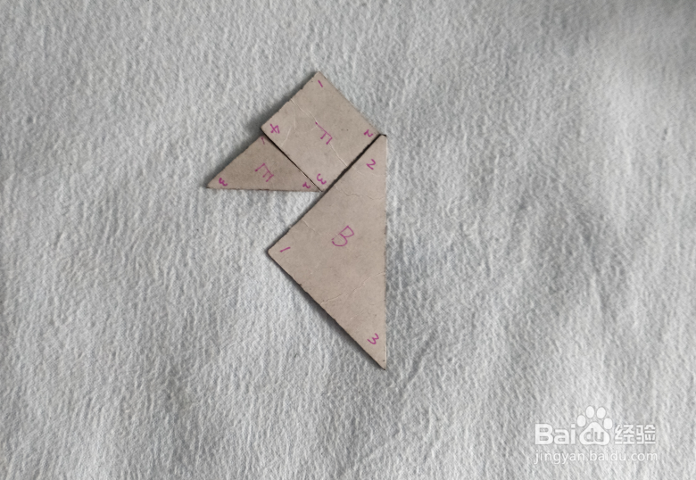 用七巧板怎样拼一只企鹅幼崽?