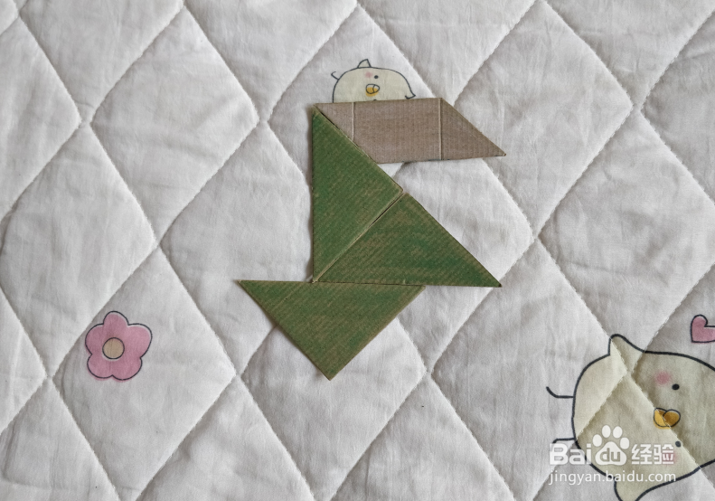 用九巧板怎么拼一个终点冲刺的小哥哥呢？