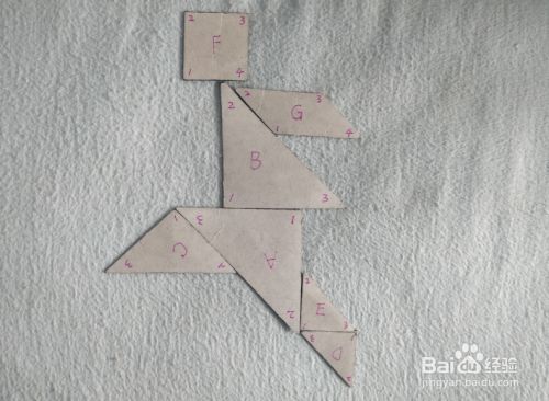 用七巧板怎样拼一个跳远的人?