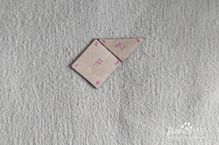 用七巧板怎样拼一只趴着滑行的企鹅?