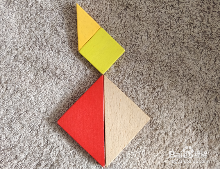 坐着的小猫用七巧板怎么拼