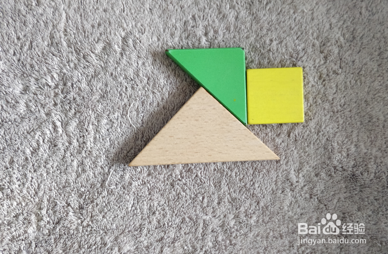 用七巧板怎样拼一只兴奋的狗？