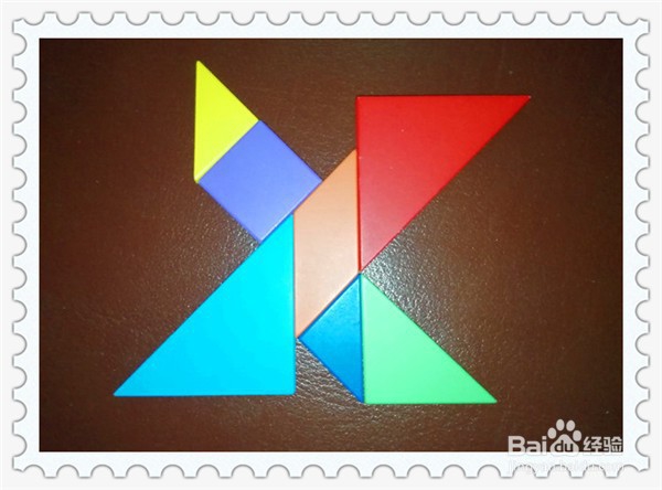 怎么样玩七巧板拼字母X