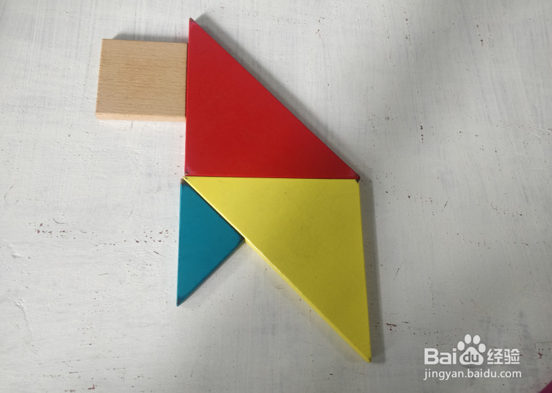 用七巧板怎样拼一只坐着看前方的猴子?