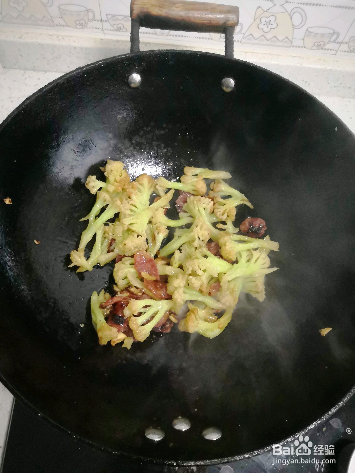 花菜炒腊肠的做法