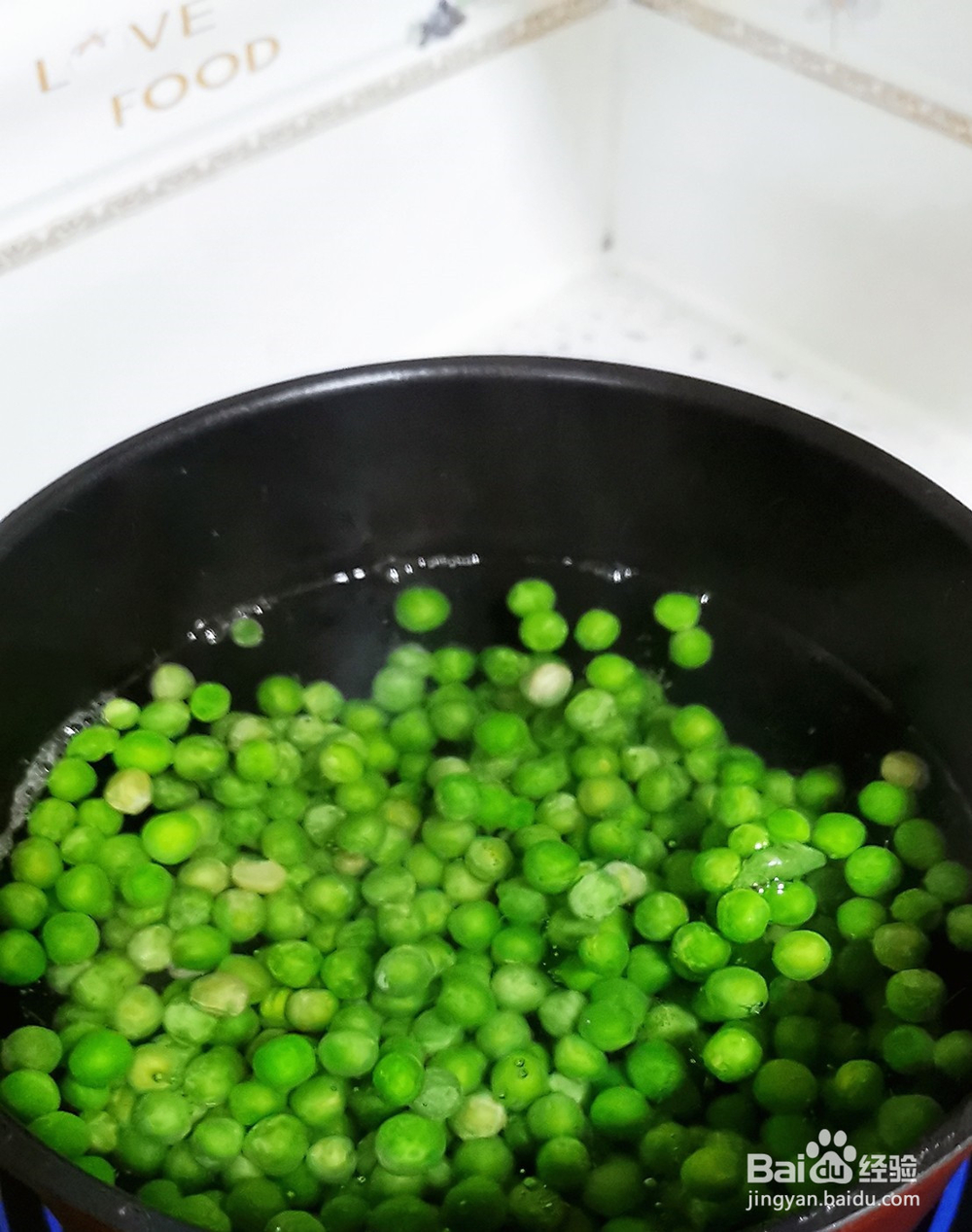 青豆炒火腿的做法