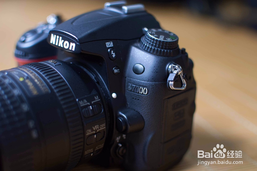 尼康d7000镜头出不来怎么办
