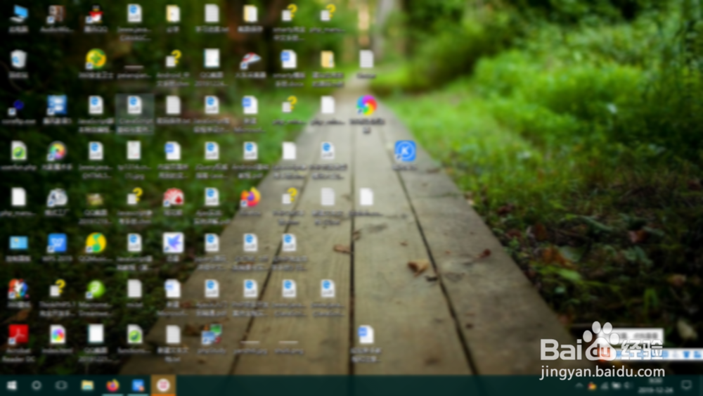 win10系统电脑如何隐藏桌面所有图标？