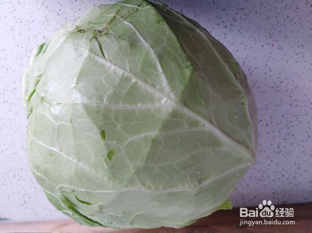 怎么做手撕包菜炒腊肉
