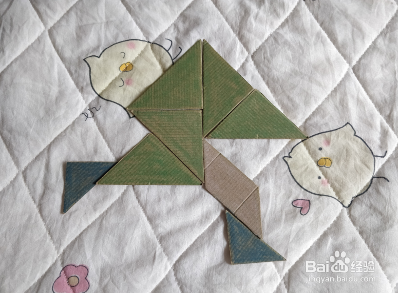 用九巧板怎么拼一个跑步锻炼的小哥哥呢？