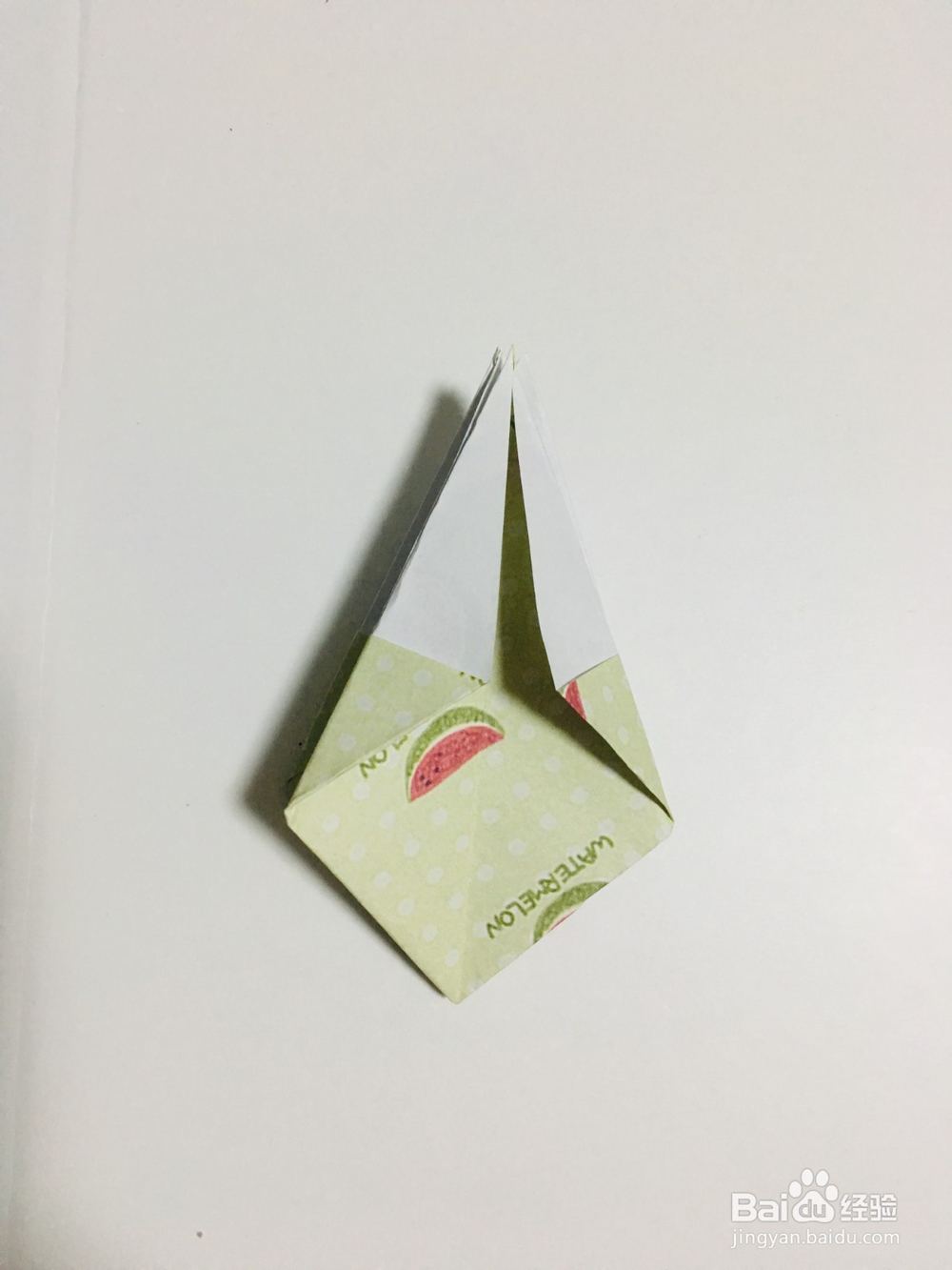 手工折纸：怎样用纸折一个四角星盒子？