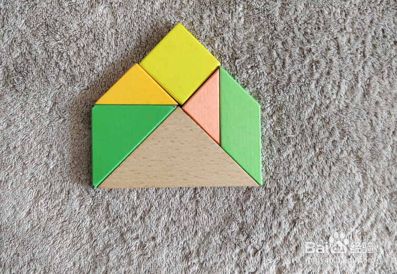 用七巧板怎样拼一个杏核？