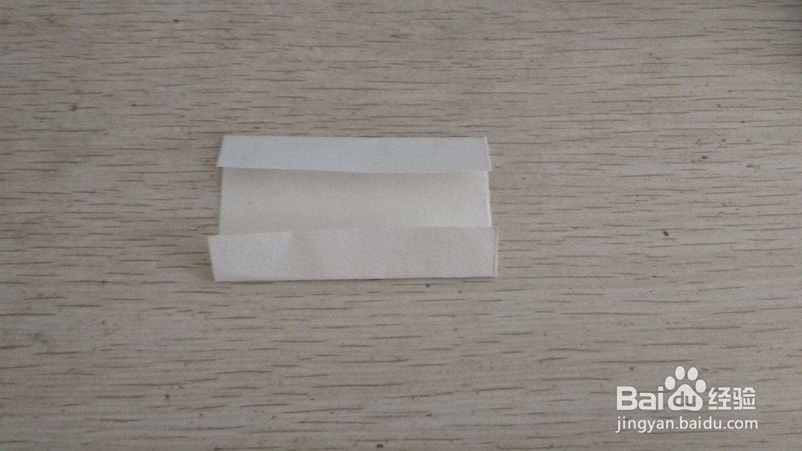 如何用一块正方形的纸做简易的中性笔的支架